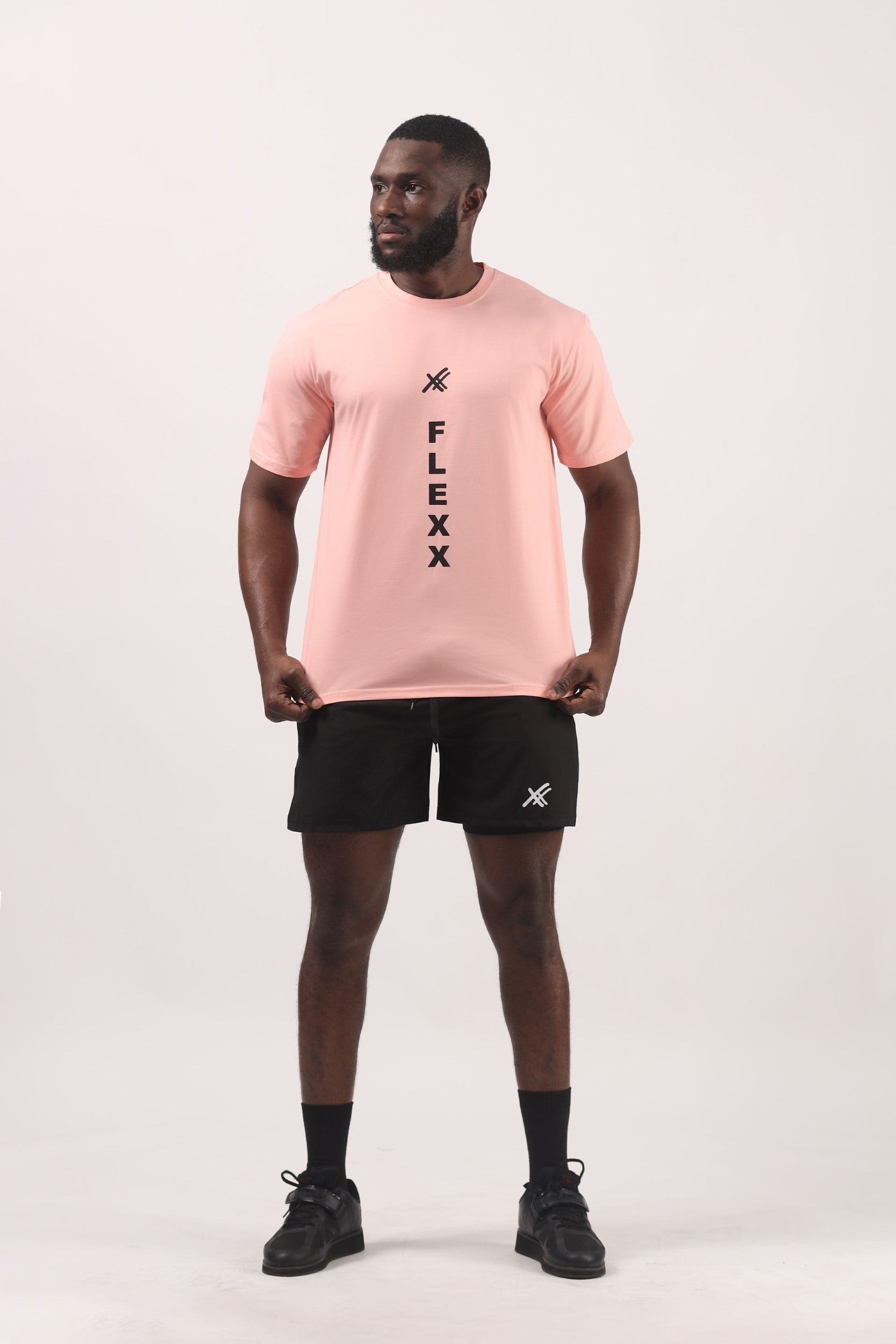 Collection of Basic Ts pink men in a gallery layout