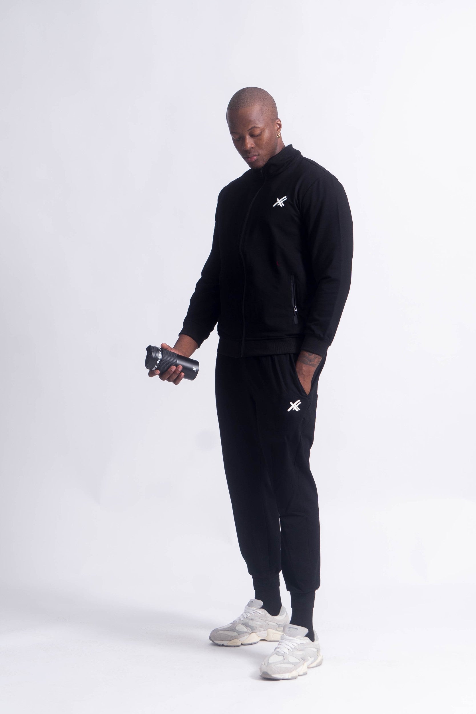 Collection of Black Tracksuit Set in a gallery layout