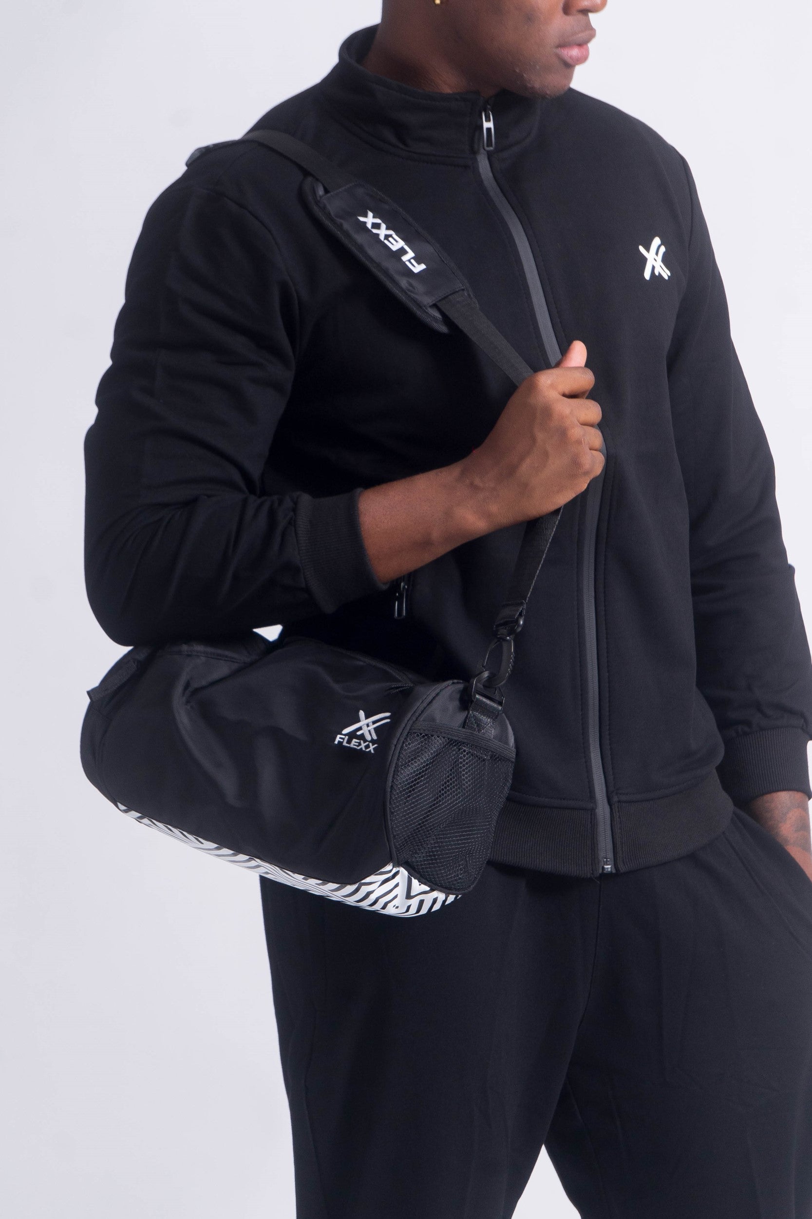 Collection of Black Tracksuit Set in a gallery layout